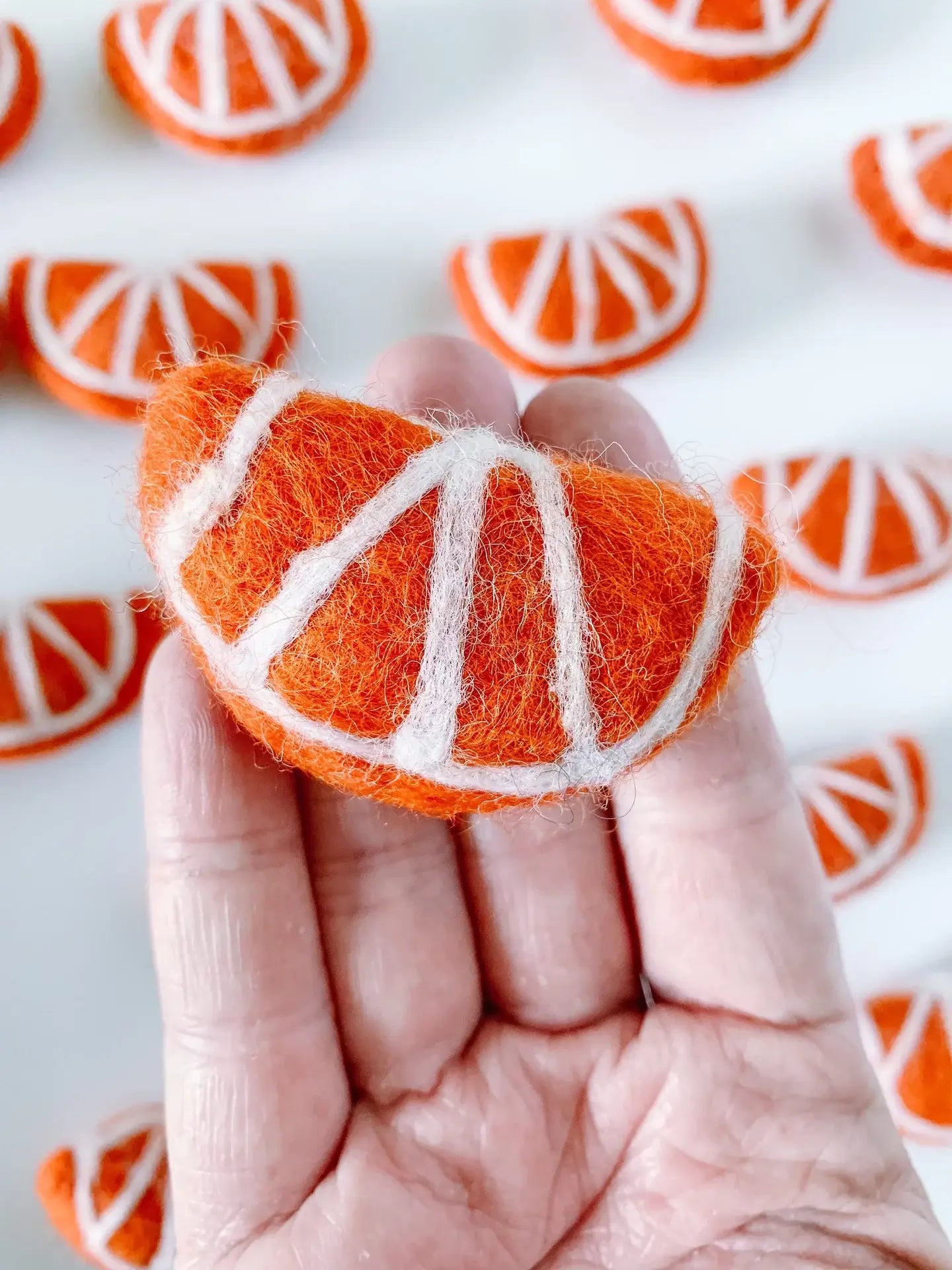 one felt orange slice