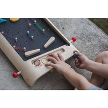 Load image into Gallery viewer, Child Playing Pinball Set by Plan Toys
