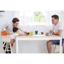 Load image into Gallery viewer, family at a table with a toddler using the High Chair - Orange
