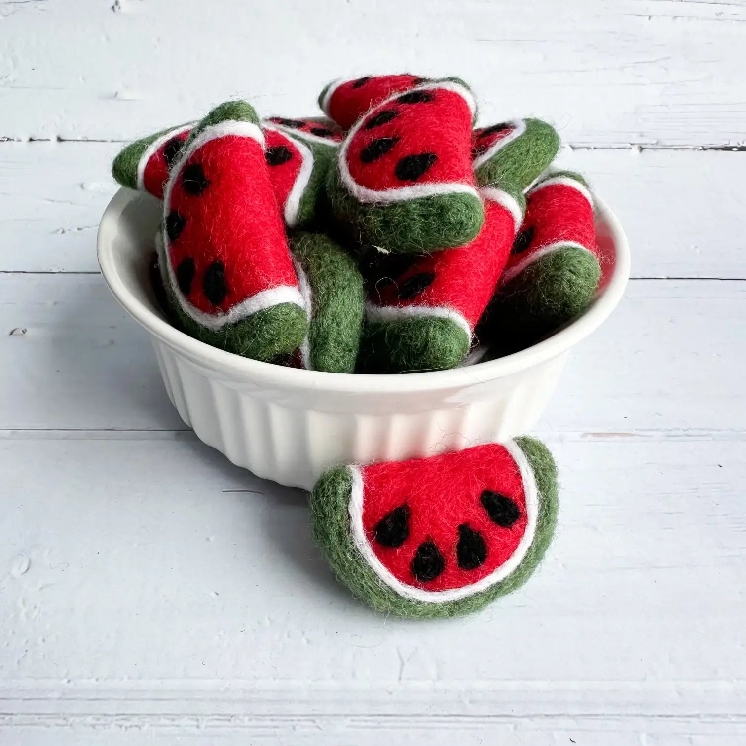 felt watermelon slices in a white bowl