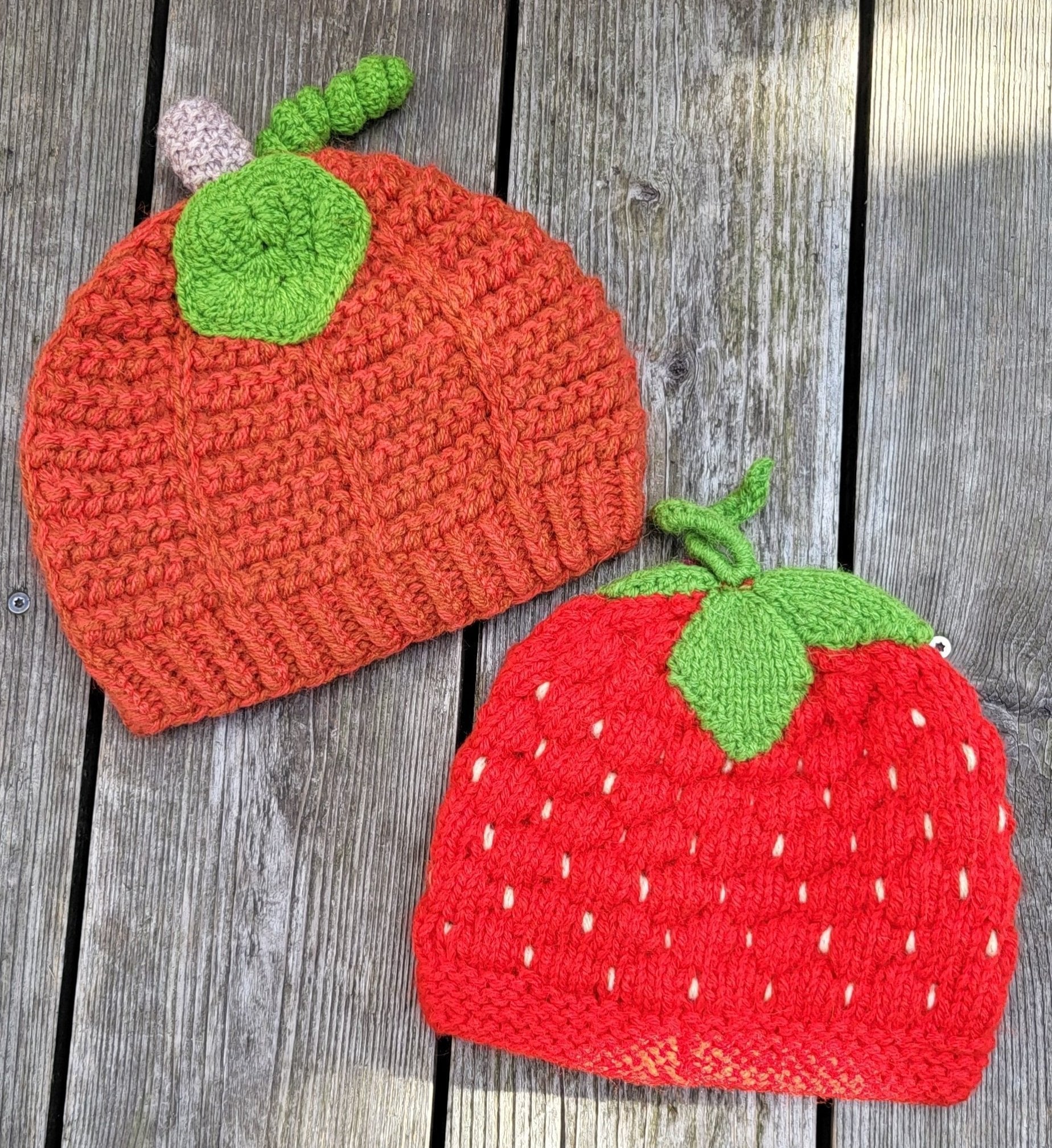 Pumpkin and strawberry hats flat lay