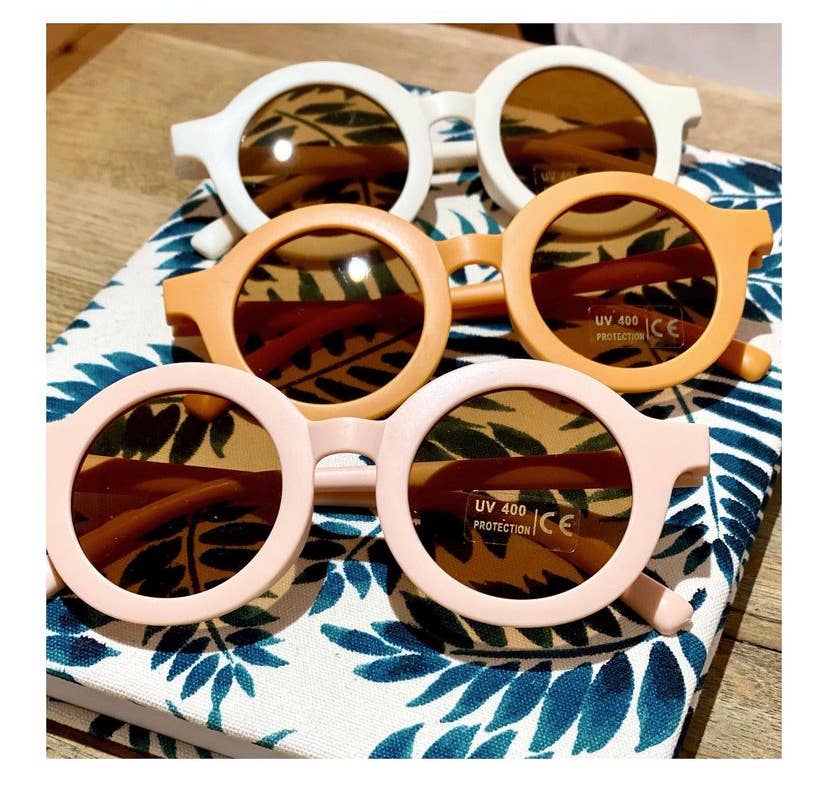 eco sunglasses in white, orange and mauve