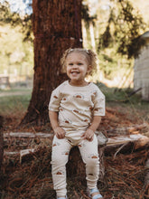 Load image into Gallery viewer, child playing outside wearing sun organic short sleeve tee
