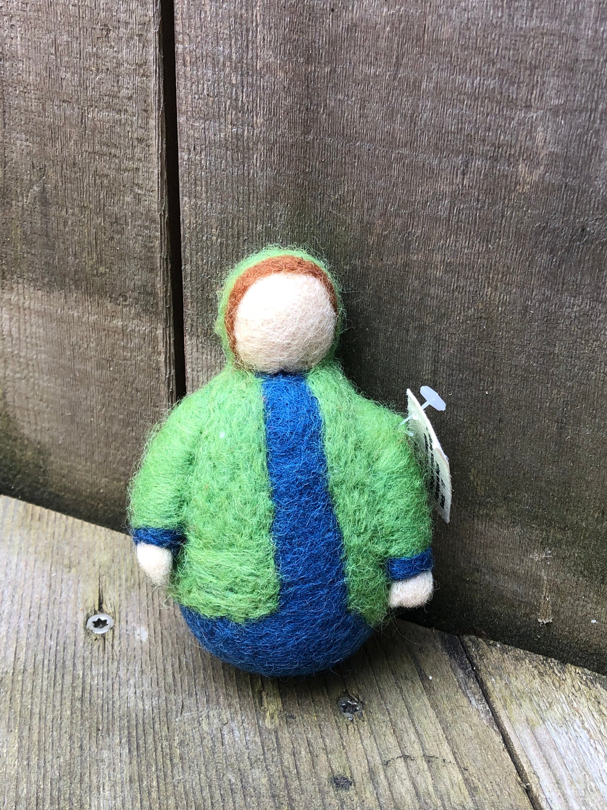 Green woolfelt rolypoly doll