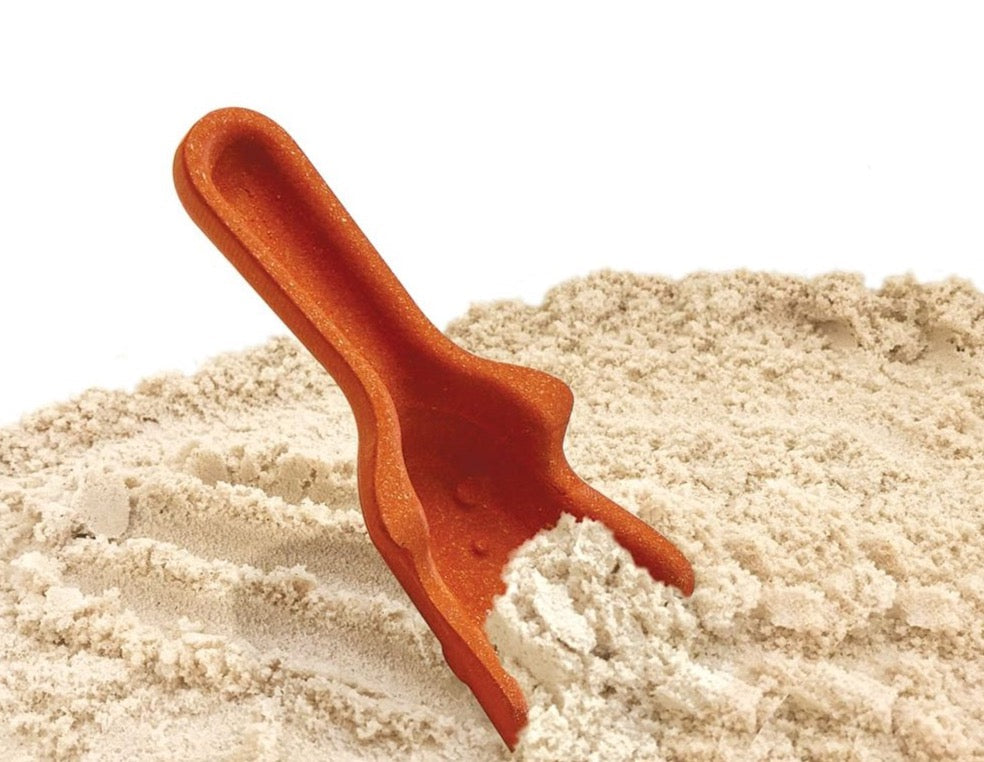 orange shovel from sand play set