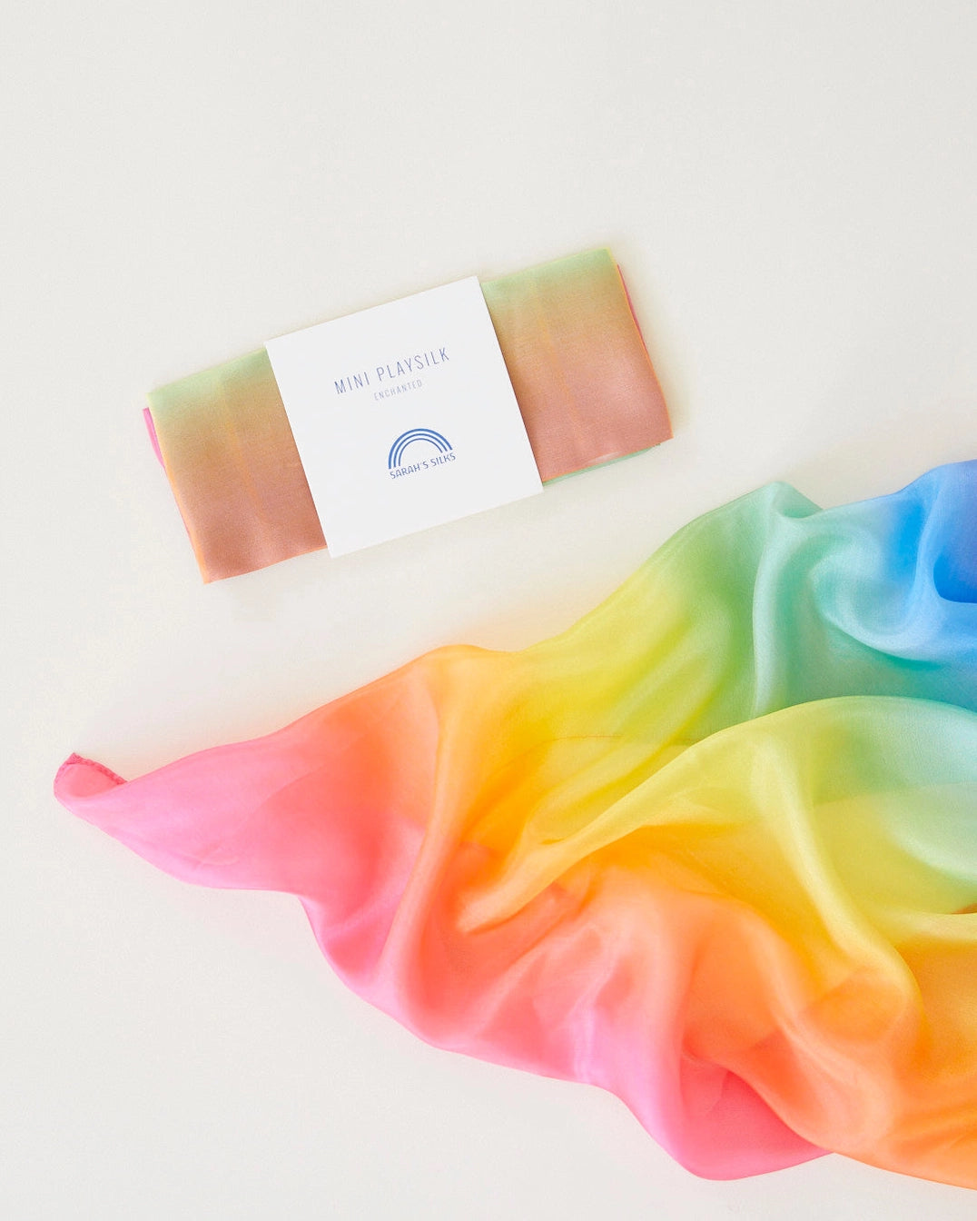 mini rainbow playsilk flat lay