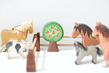 Load image into Gallery viewer, ostheimer brown horses grey pony and a spotted pig with stable gates and an apple tree
