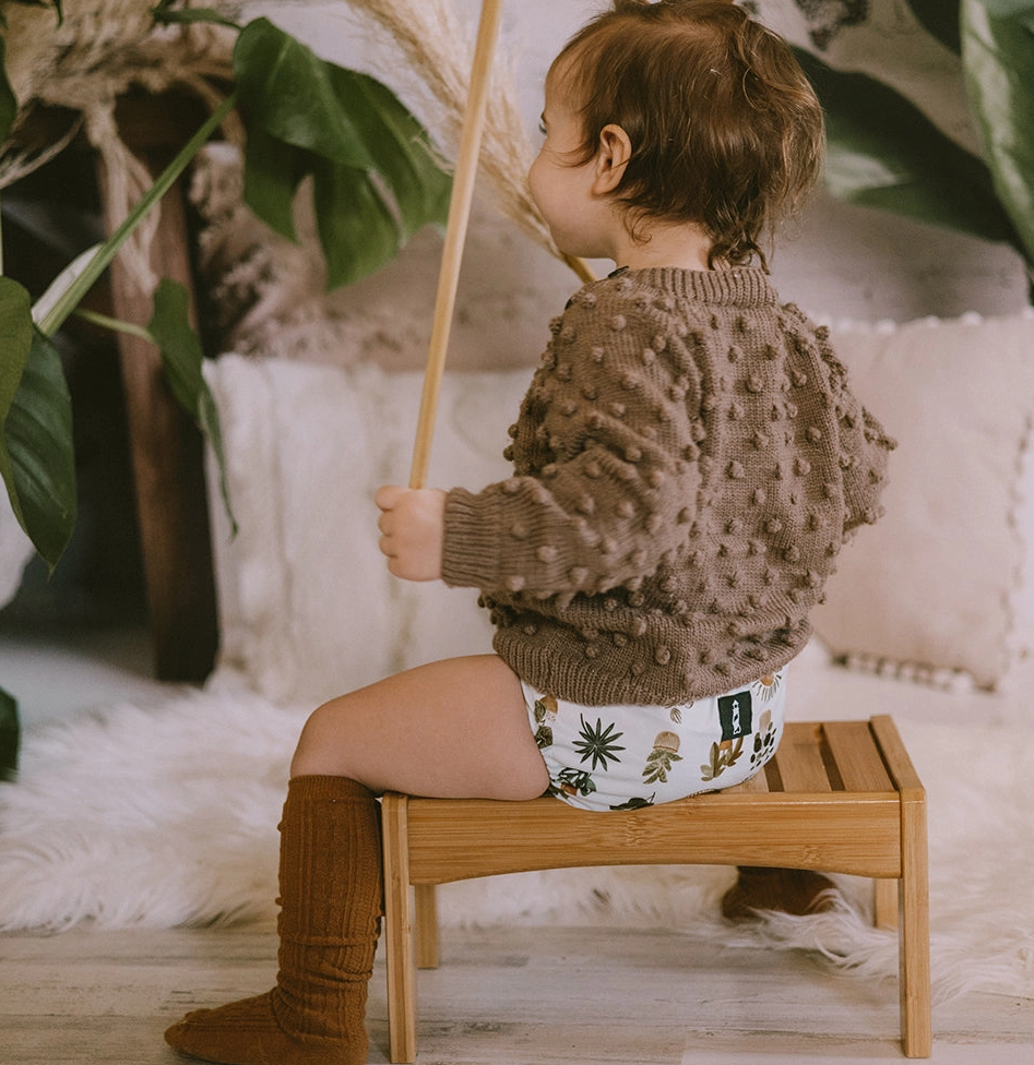 baby in plants cloth diaper